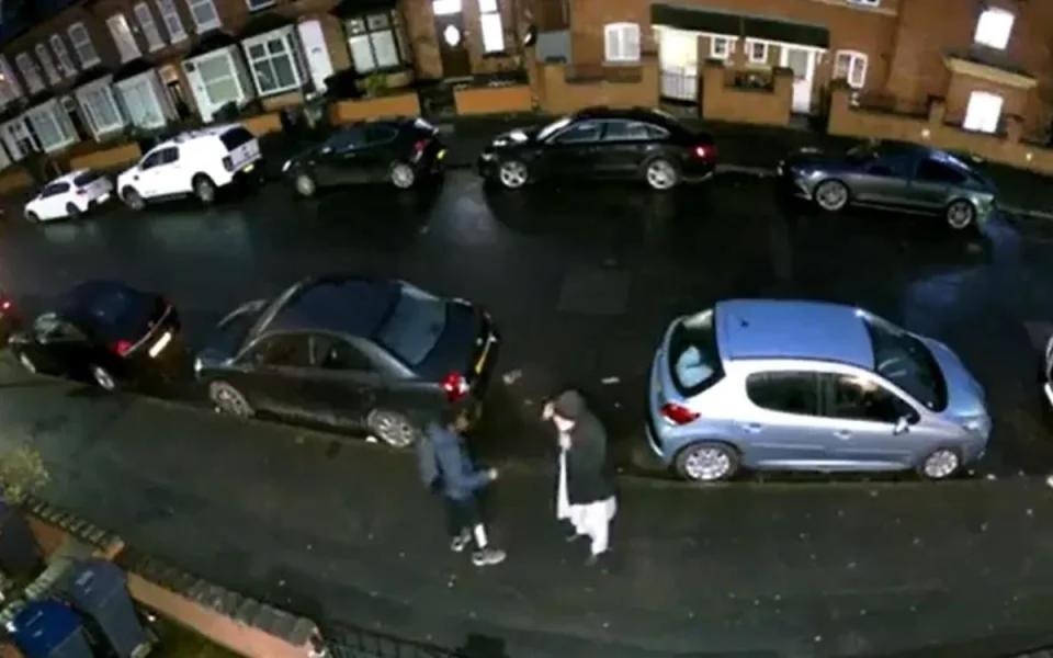 The suspect can be seen speaking with Mr Rayaz before setting him on fire (West Midlands Police)
