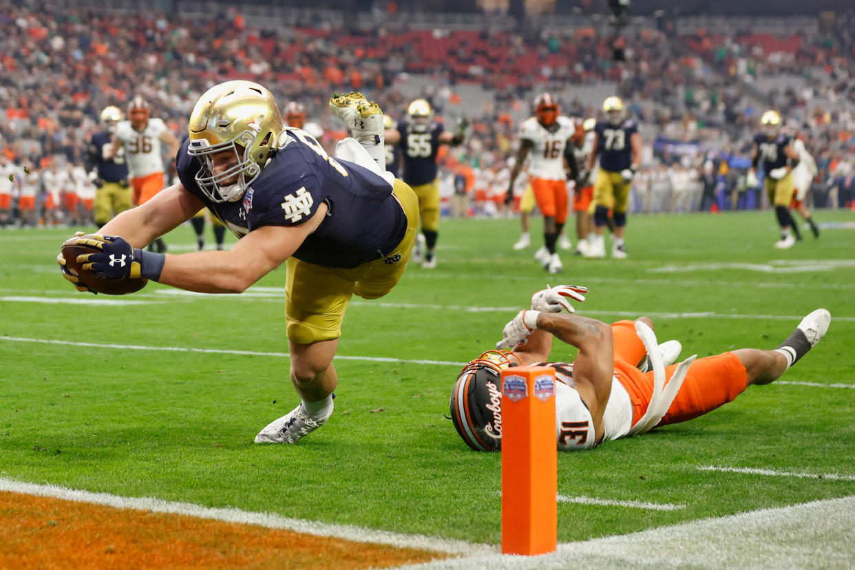 Notre Dame TE Michael Mayer (left) scored two tuchdowns in the Irish's Fiesta Bowl loss to Oklahoma State.  (Photo by Christian Petersen/Getty Images)