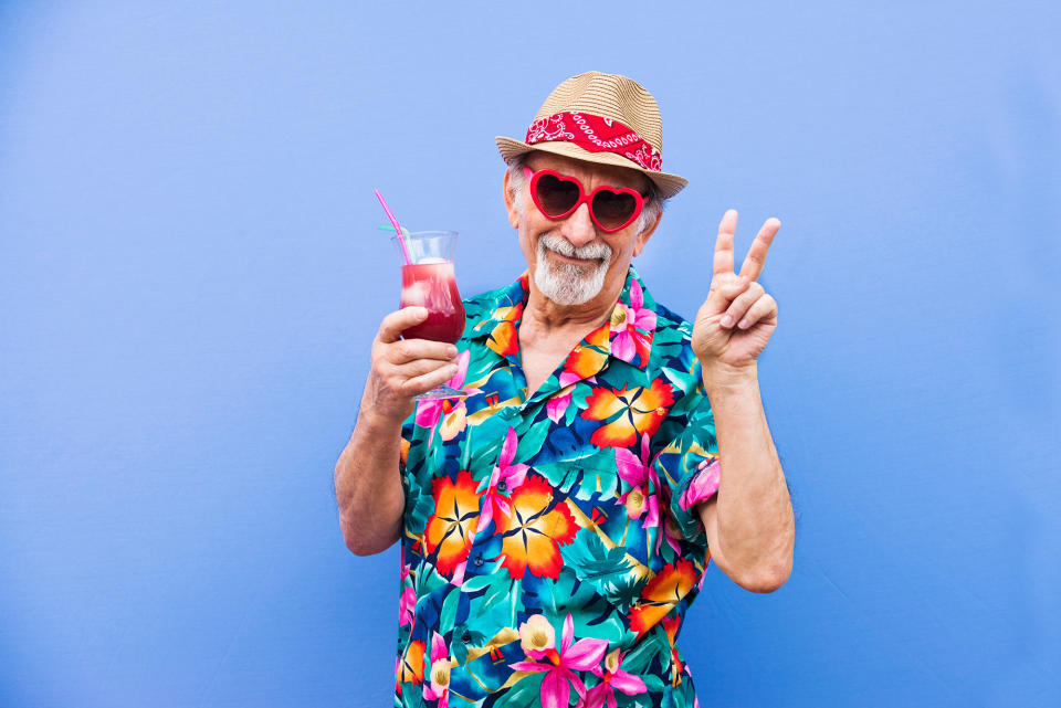 senior man wearing fun hawaiian shirt