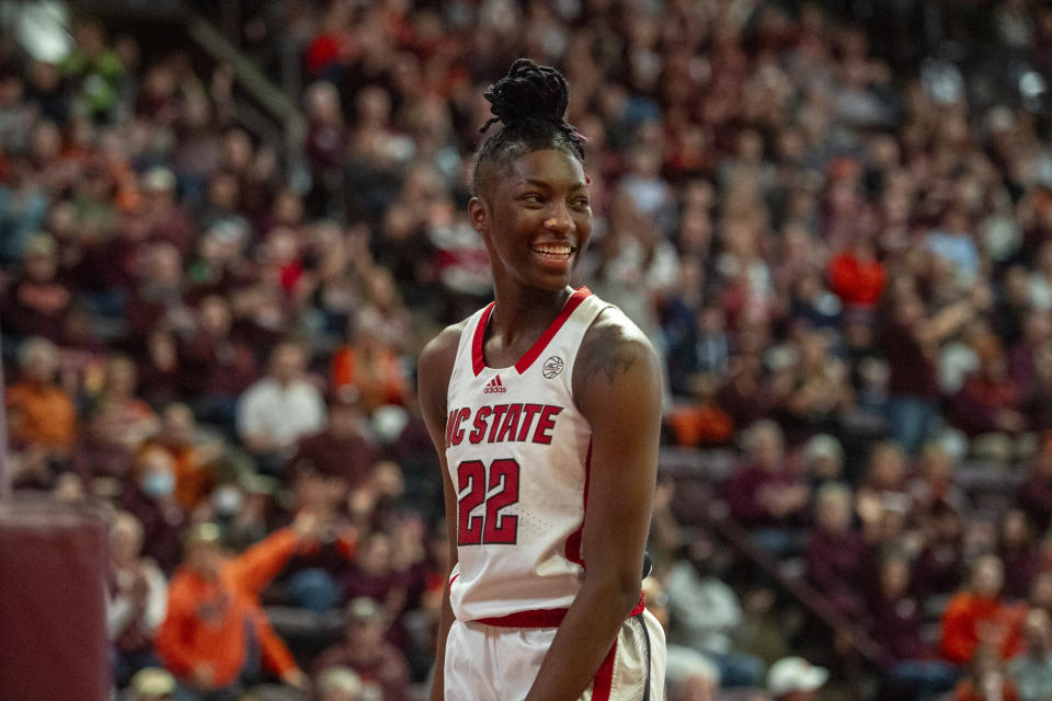 NC State's Saniya Rivers smiles on the court during the second half of an NCAA college basketball game against Virginia Tech, Sunday, Jan. 7, 2024, in Blacksburg, Va. (AP Photo/Robert Simmons)