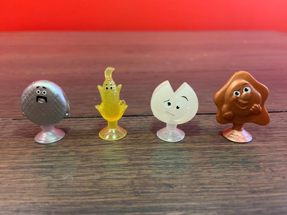 The photo shows four rare Stikeez collectibles.