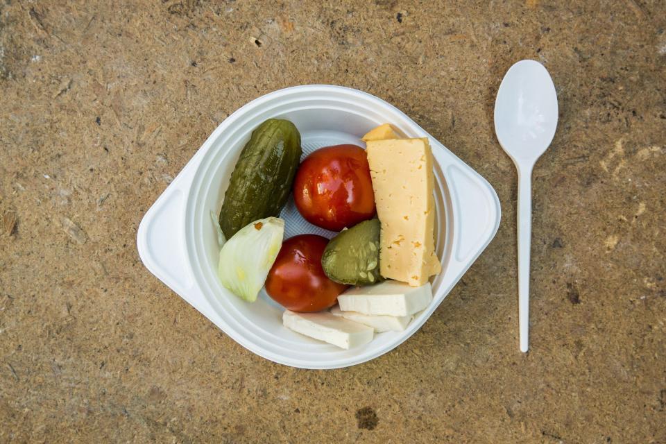 A picture shows a piece of food served by volunteers to anti-government protesters guarding barricades during a protracted stand-off with riot police in Kiev