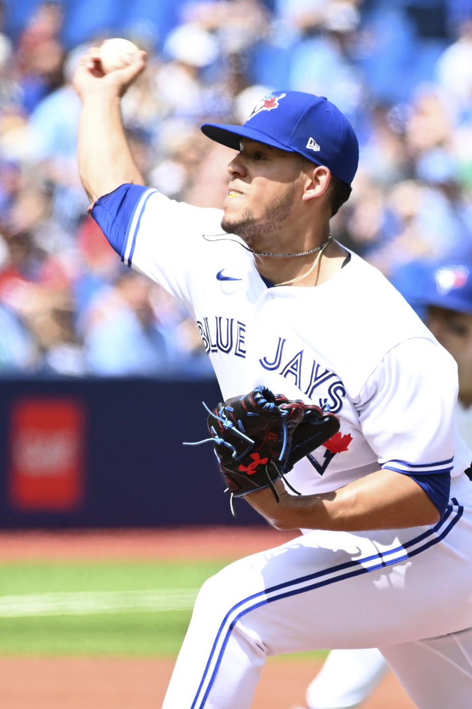 Toronto Blue Jays starting pitcher Jose Berrios throws to a Detroit Tigers batter in the first inning of a baseball game in Toronto, Sunday, July 31, 2022. (Jon Blacker/The Canadian Press via AP)