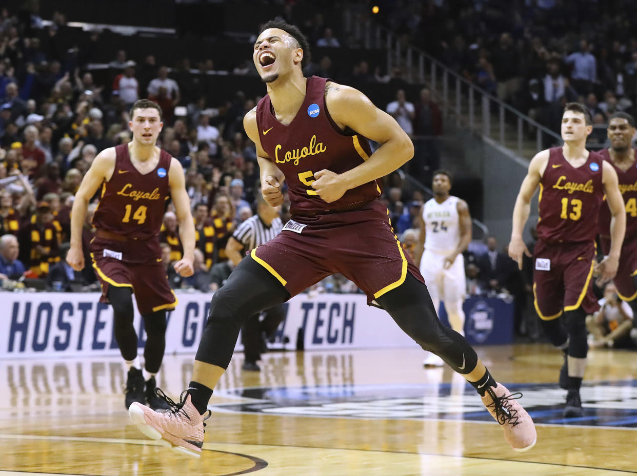 Loyola-Chicago guard Marques Townes reacts to hitting a 3-pointer in the final minute of the team’s 69-68 victory over Nevada. (Curtis Compton/Atlanta Journal-Constitution via AP)
