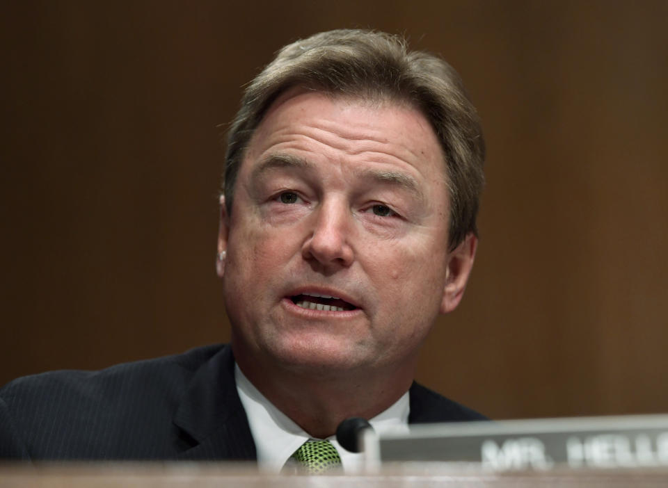 FILE - In this Jan. 30, 2018 file photo, Sen. Dean Heller, R-Nev., speaks during a Senate Banking Committee hearing on Capitol Hill in Washington. In the high-stakes race for Senate in Nevada, Democrat Jacky Rosen is taking on one of the biggest names in GOP politics by painting Sen. Dean Heller as someone without firm principles. (AP Photo/Susan Walsh, file)