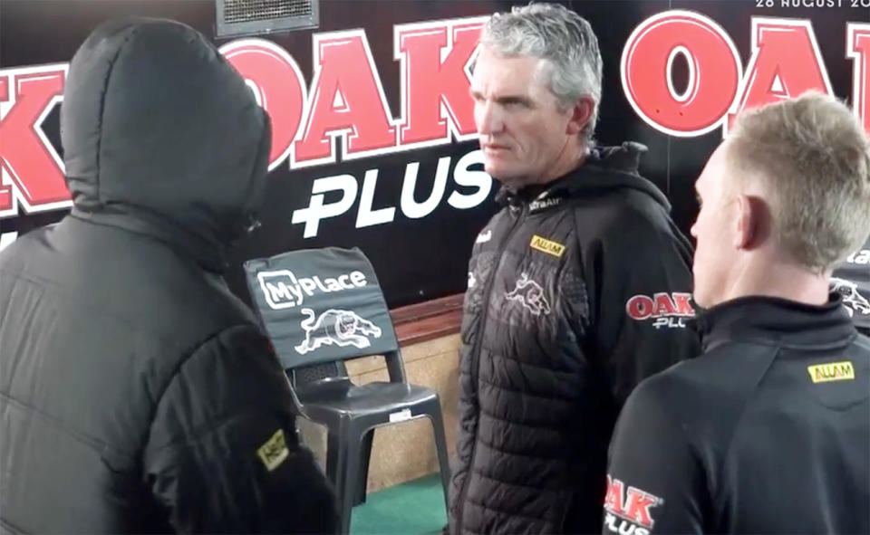 Ivan Cleary with for son Nathan in the sheds.