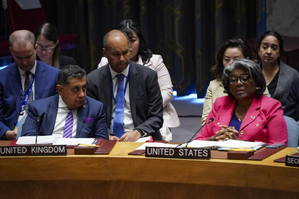 United Kingdom's Minister of State Tariq Mahmood Ahmad, left, listens as United States United Nations Ambassador Linda Thomas-Greenfield, right, address a United Nations Security Council meeting on the conflict between Armenia and Azerbaijan, Thursday Sept. 21, 2023, at the United Nations headquarters. (AP Photo/Bebeto Matthews)