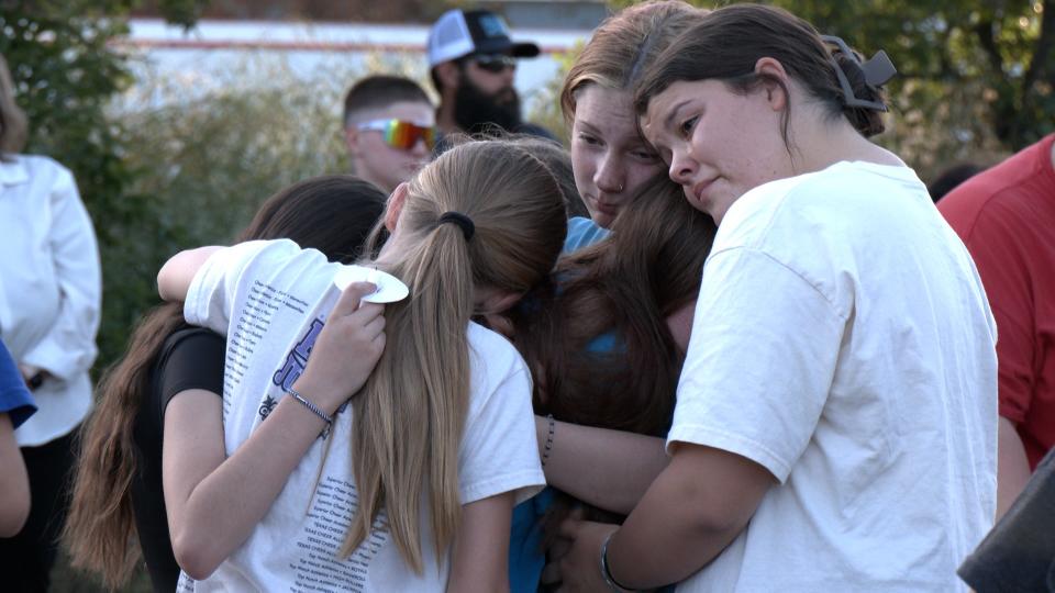 Ryan Bilby’s younger sister Brittney held in group embrace by friends