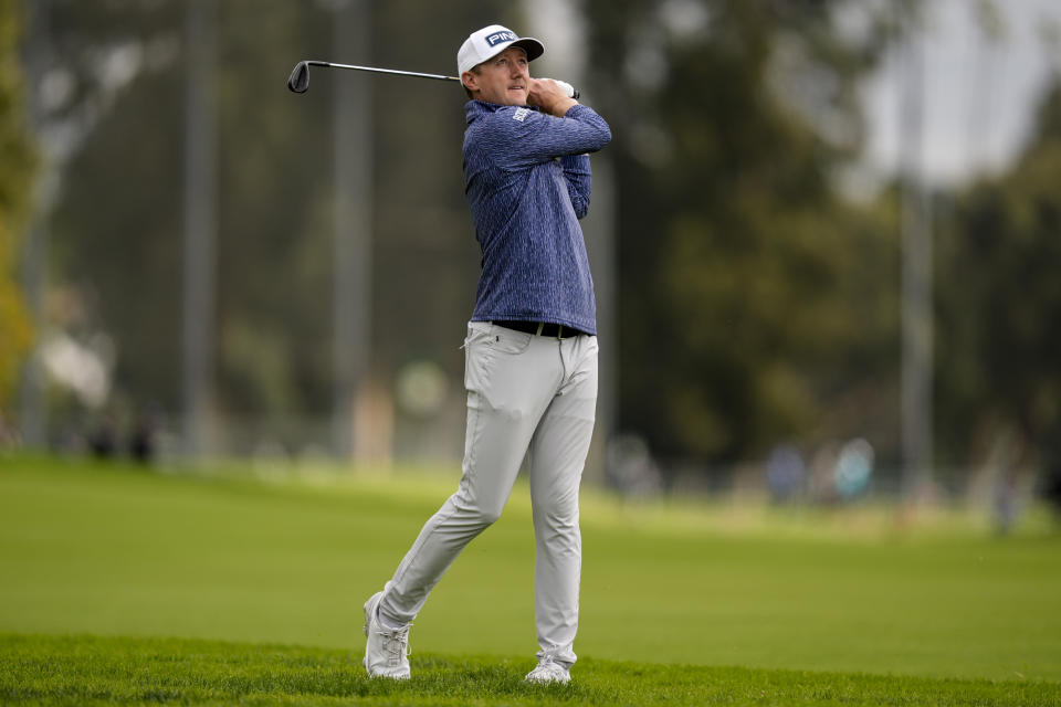 Mackenzie Hughes, of Canada, hits from the third fairway during the final round of the Genesis Invitational golf tournament at Riviera Country Club, Sunday, Feb. 18, 2024, in the Pacific Palisades area of, Los Angeles. (AP Photo/Ryan Sun)