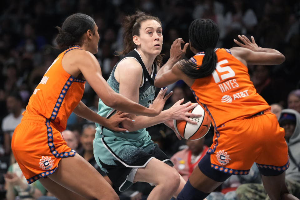 Connecticut Sun guard Tiffany Hayes (right) and forward Olivia Nelson-Ododa guard New York Liberty forward Breanna Stewart during Game 2 of their WNBA semifinals series on Sept. 26, 2023, in New York. (AP Photo/Mary Altaffer)