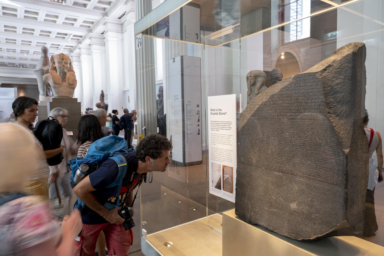 Visitors look at the Rosetta Stone at the British Museum, August 24, 2022 in London, England. / Credit: Mike Kemp/In Pictures/Getty