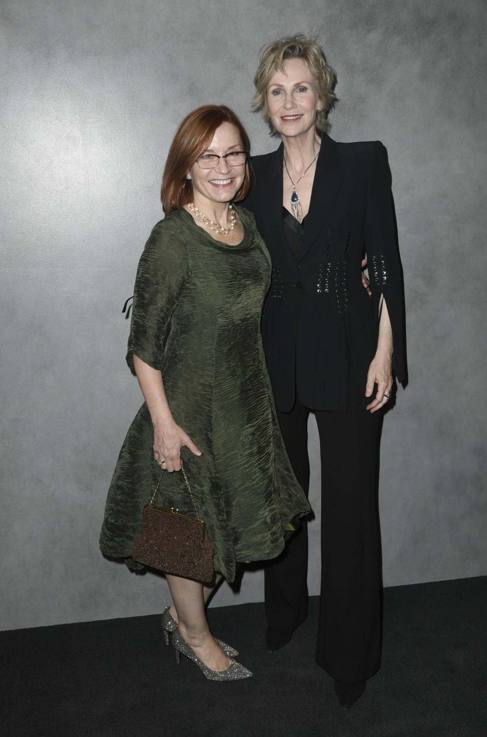 Jennifer Cheyne and Jane Lynch at a formal event