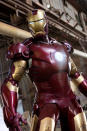 <b>Mark III:</b> <br> The first red-and-gold armor. The first cut of "Iron Man" didn't have the scene where Tony's suit gets assembled piece-by-piece around him, but after the success of "Transformers," the studio handed over more money to add in some additional high-tech gadgetry. In the new photo, the suit is still battle-damaged from Stark's climatic fight with Iron Monger.