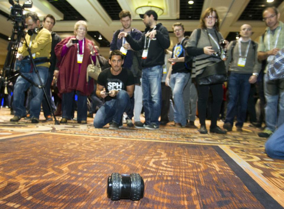 A Sphero 2B by Orbotix is demonstrated during "CES Unveiled," a media preview event to the annual Consumer Electronics Show (CES), in Las Vegas, Nevada, January 5, 2014. The toy, estimated to retail for about $100, is controlled with a smartphone and is expected to ship in the fall of 2014, a representative said. (REUTERS/Steve Marcus)