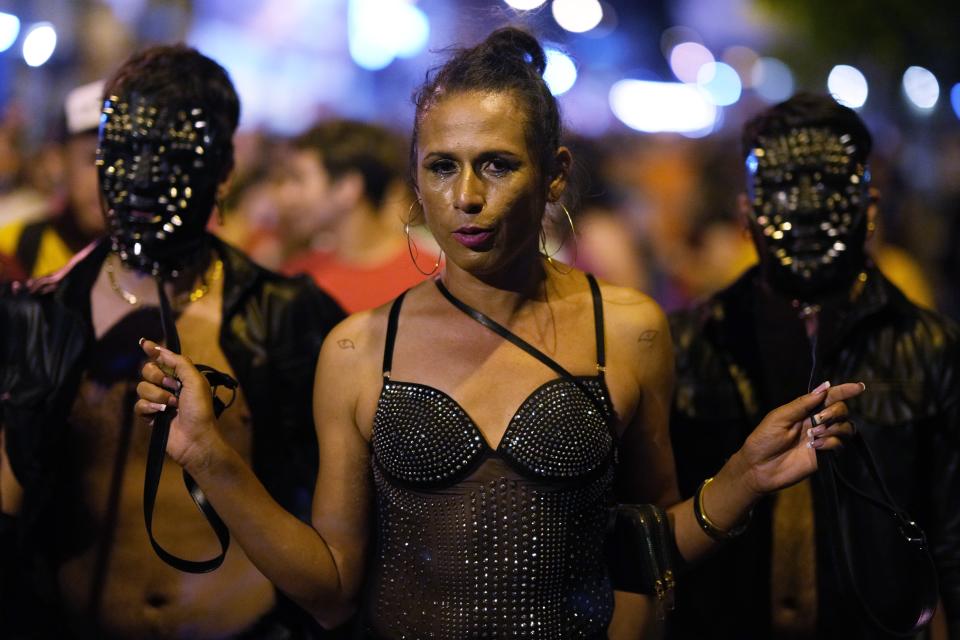 Members of Paraguay's LGBTQ+ community march to highlight discrimination and demand equal rights, during the 20th LGBTQ+ annual march, in Asuncion, Paraguay, Saturday, Sept. 30, 2023. (AP Photo/Jorge Saenz)