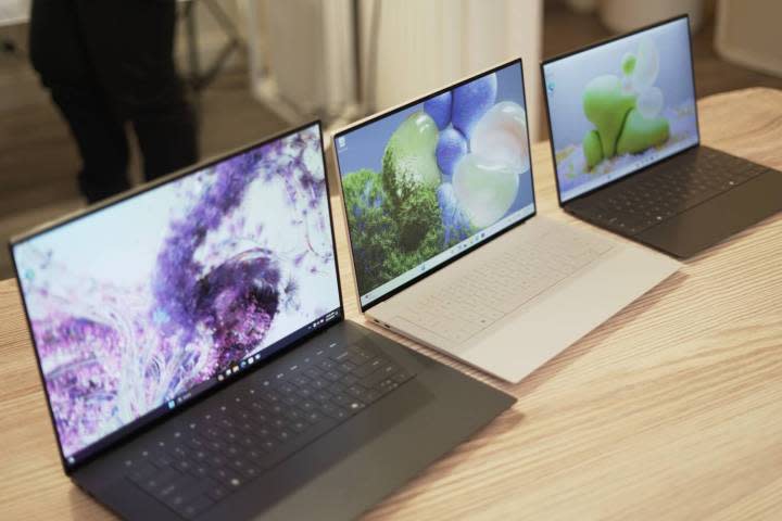 The XPS 13, 14, and 16 lined up on a table.
