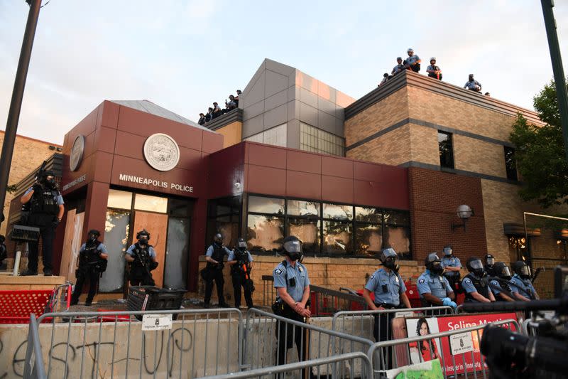 Protesters gather near the Minneapolis Police third precinct