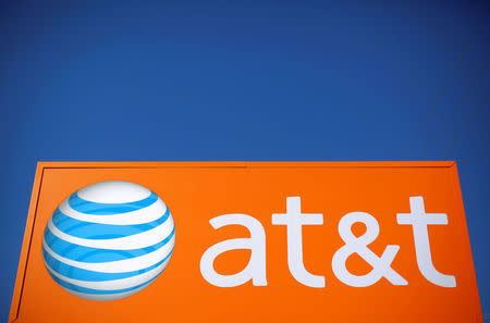 An AT&T sign is seen outside a branch in Rolling Meadows, Illinois, U.S., October 24, 2016. REUTERS/Jim Young