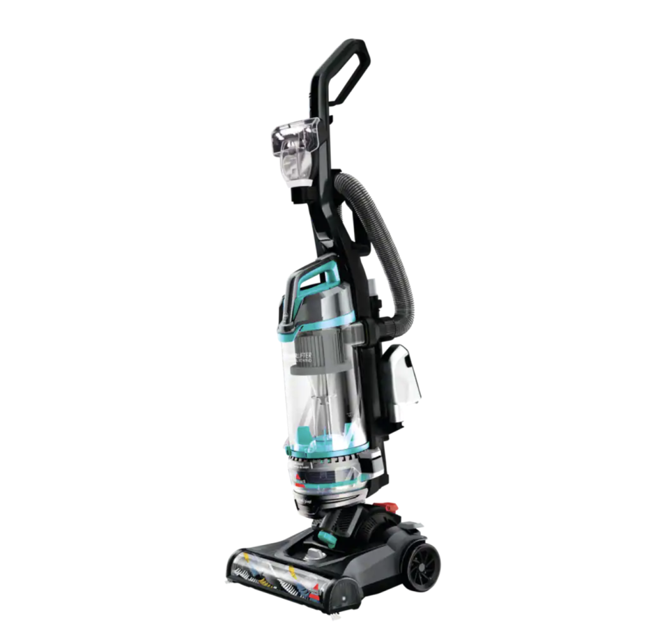 Bissell's PowerLifter Upright Vacuum Cleaner features a triple action brush that fights through the toughest dirt stains. (Photo via Canadian Tire)