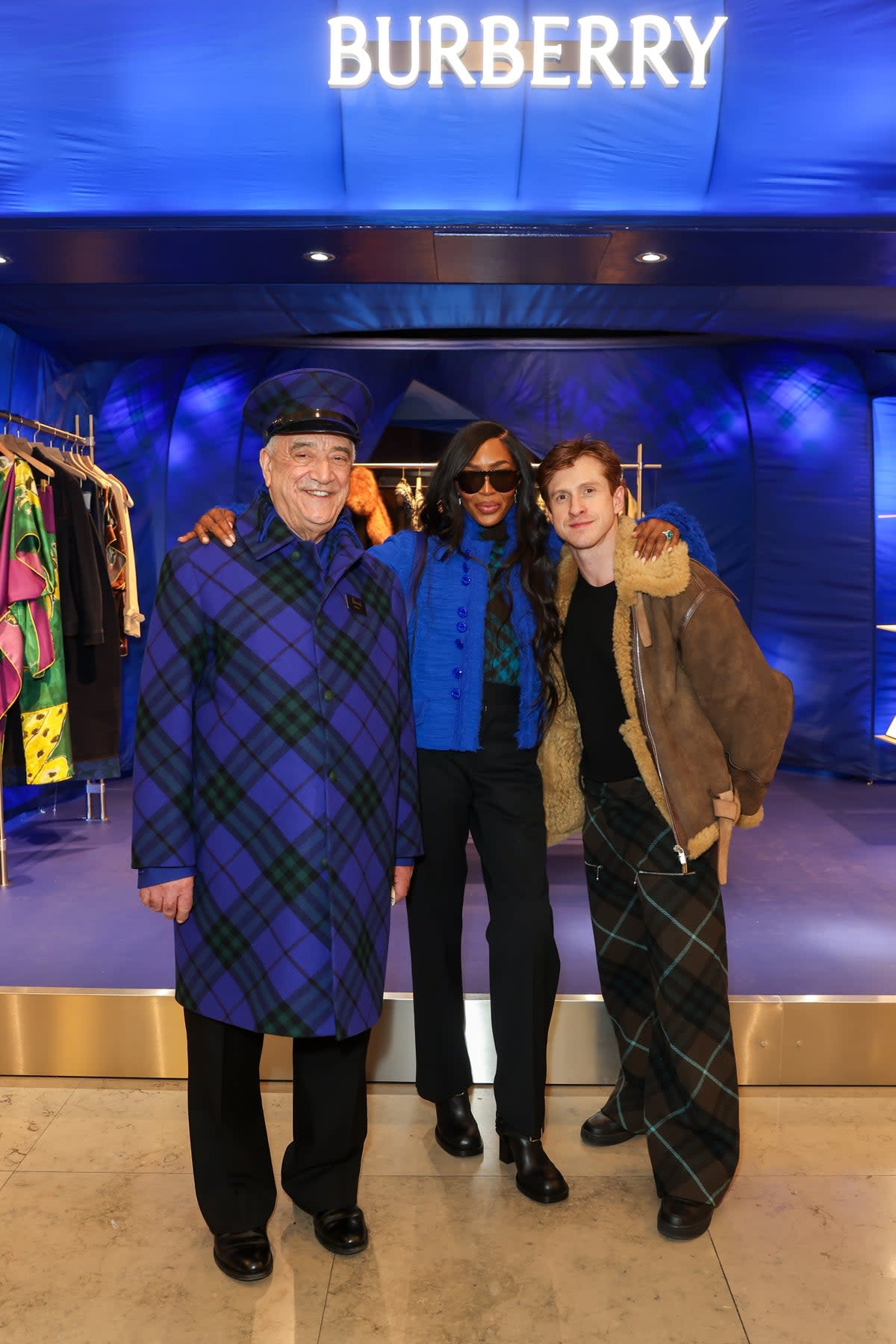 Naomi Campbell and Daniel Lee, Chief Creative Officer, with his reimagined Harrods doorman in Burberry Knight blue (Dave Benett/Getty Images for ...)