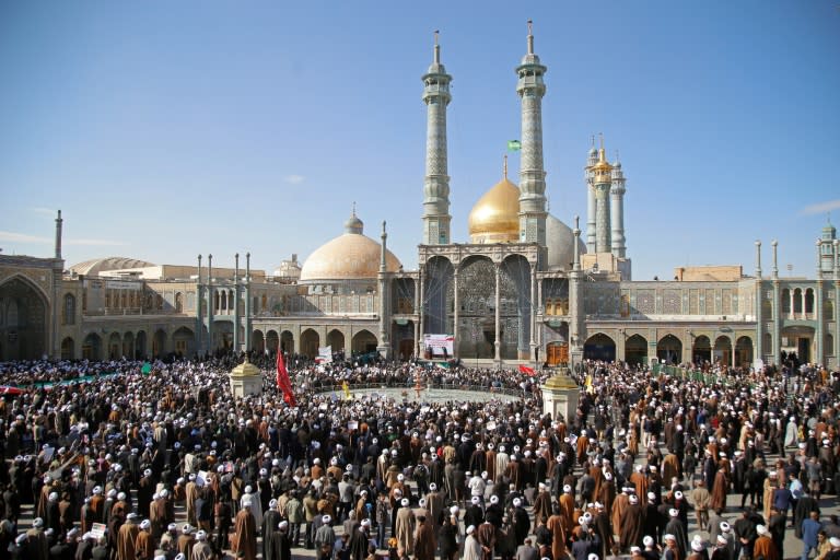 Pro-government demonstrators gather in Iran's holy city of Qom on January 3, 2018