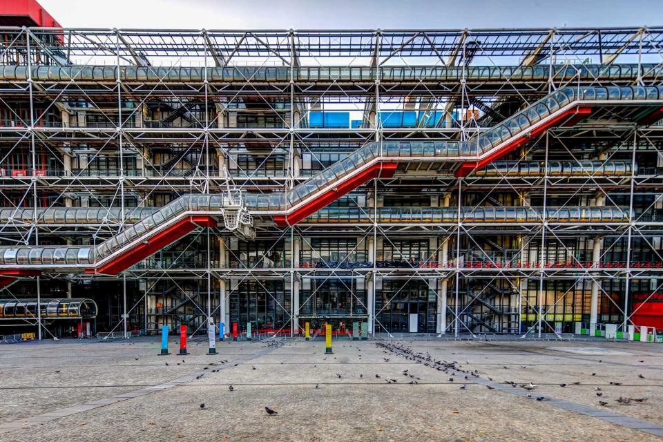 Exterior of the Pompidou Center designed by Renzo Piano and Richard Rogers featuring exposed pipes and infrastructure