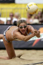 Kerri Walsh digs the ball as she and Misty May-Treanor defeated Tammy Leibl and Dianne DeNecochea in their semifinal match in the AVP Cuervo Gold Crown Boulder Open at the Boulder Reservoir on August 27, 2006 in Boulder, Colorado. Kerri Walsh and Misty May-Turner went on to defeat Annett Davis and Jenny Johnson Jordan in the womens championship match.