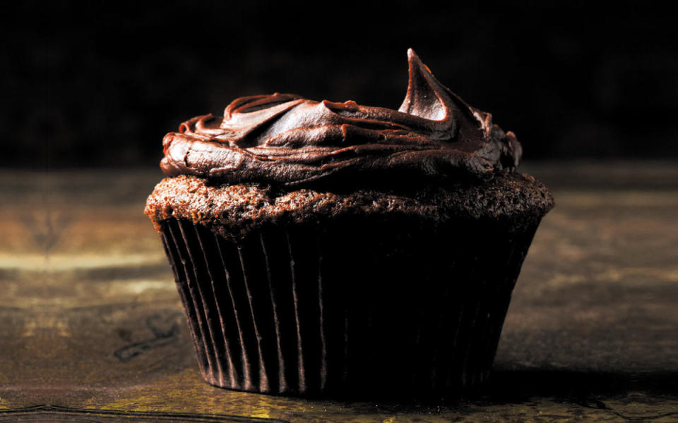 <p>A thick slather of fudgy ganache makes these cupcakes an extra-special chocolaty treat.</p><p><strong>Recipe: </strong><strong><a href="https://parade.com/210939/parade/deep-chocolate-decadent-cupcakes-the-only-recipe-youll-ever-need/" rel="nofollow noopener" target="_blank" data-ylk="slk:Decadent Deep Chocolate Cupcakes with Fudgy Ganache;elm:context_link;itc:0;sec:content-canvas" class="link ">Decadent Deep Chocolate Cupcakes with Fudgy Ganache</a></strong></p>