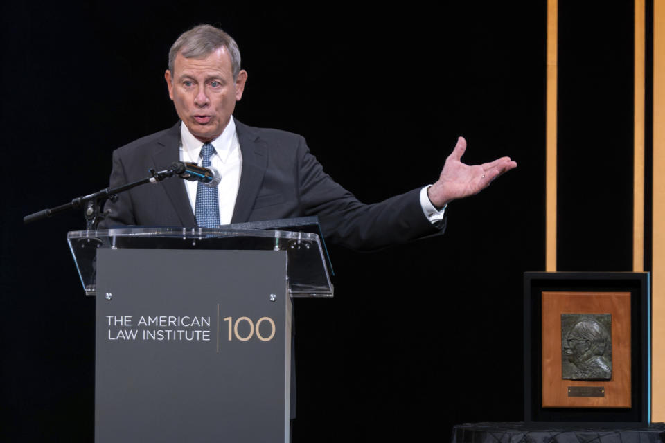 Supreme Court Chief Justice John Roberts speaks as her receives the Henry J. Friendly Medal during the American Law Institute's annual dinner in Washington, Tuesday, May 23, 2023. (AP Photo/Jose Luis Magana)