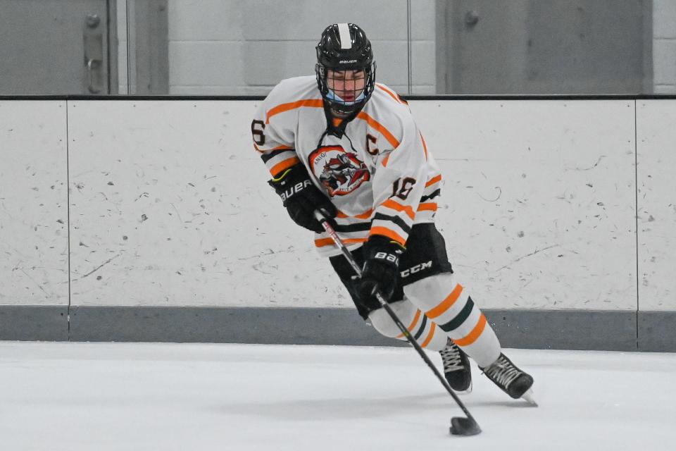 Matthew Dennison playing in a high school hockey game in December 2021.