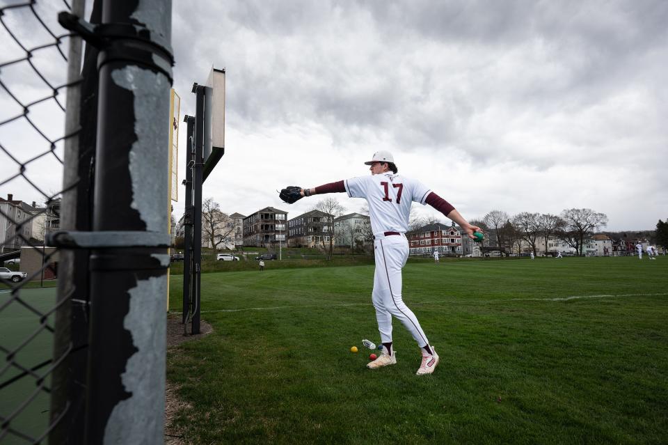 Worcester Academy's Mavrick Rizy warms up before facing Phillips Exeter on Saturday April 13, 2024 at Gaskill Field.