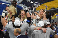 <p>Quarterback for the New England Patriots Tom Brady (R) his daughter Vivian Lake Brady and teammates celebrate after winning Super Bowl LIII against the Los Angeles Rams at Mercedes-Benz Stadium in Atlanta, Georgia, on February 3, 2019. (Photo by Angela Weiss / AFP) </p>