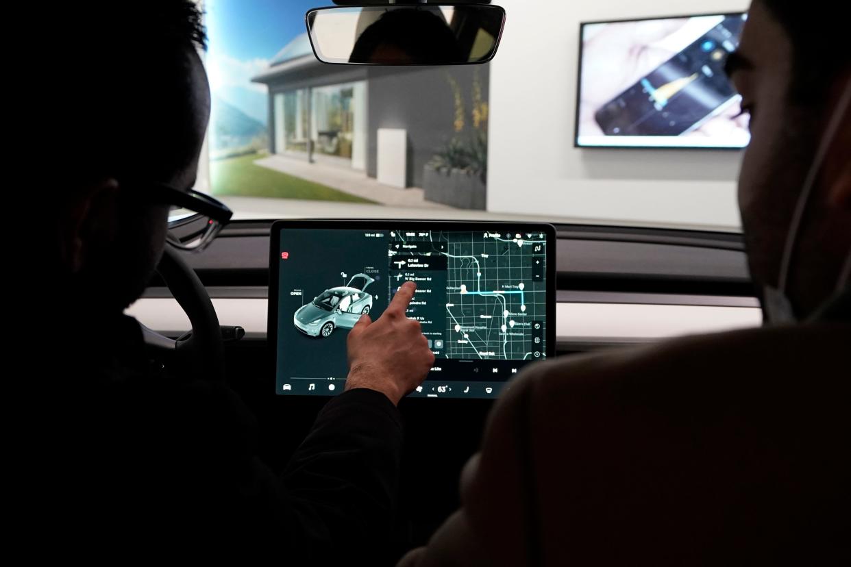 Tesla is giving a way a month of free Full Self-Driving.