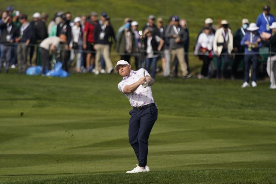 Canelo Alvarez follows his approach to the fourth green during the Pebble Beach Pro-Am in February.