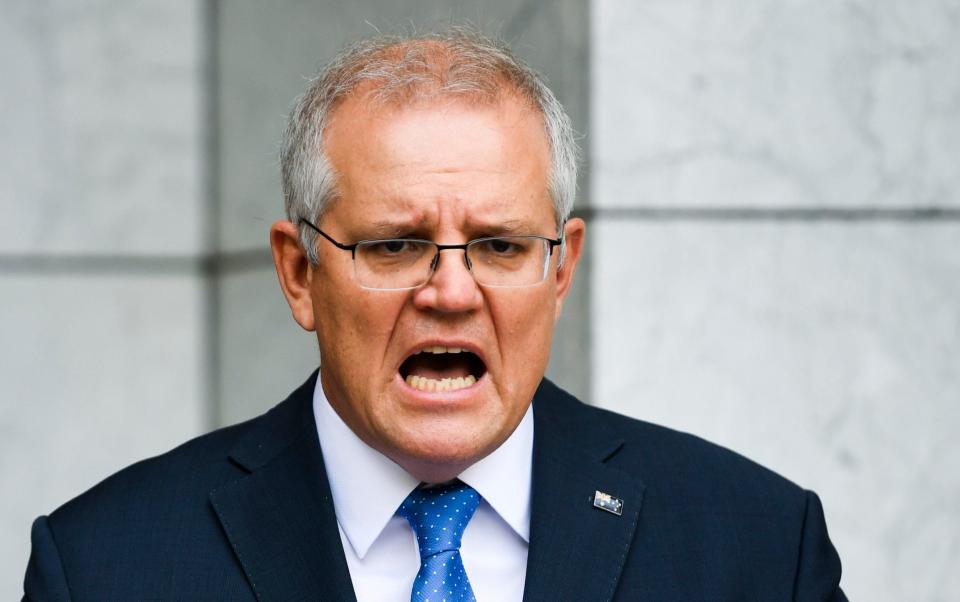 Scott Morrison - Lukas Coch/AAP Image via AP)/Lukas Coch/AAP Image via AP)