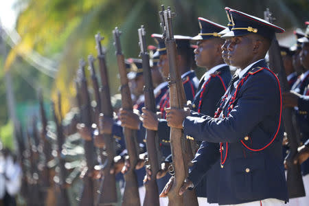 Members of the Haitian Armed Forces (FAD'H) stand in formation as they wait for the start of a military parade in the streets of Cap-Haitien, Haiti, November 18, 2017. REUTERS/Andres Martinez Casares