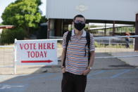 Bernie Sanders supporter Sergio Marquez poses for a photo outside of a polling station during primary voting on Tuesday, June 2, 2020, in Santa Fe, New Mexico. Marquez wanted to vote for Sanders even though he's out of the race and Joe Biden is the presumptive Democratic presidential nominee. But Marquez says he wasn't able to vote because he had not registered as a Democrat; New Mexico's primaries are closed to party members. (AP Photo/Cedar Attanasio)