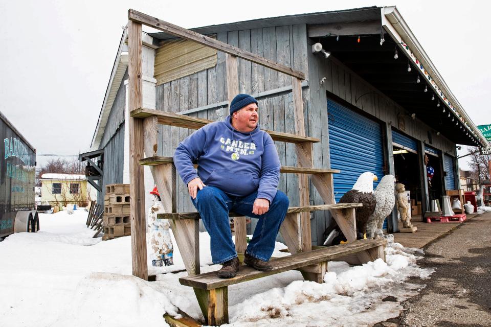 Dean Barner sits outside Barner's Farm Market on Feb. 2, 2022, in Erie. Barner, who owns the Millcreek Township market, is recovering from a long period of illness with COVID.