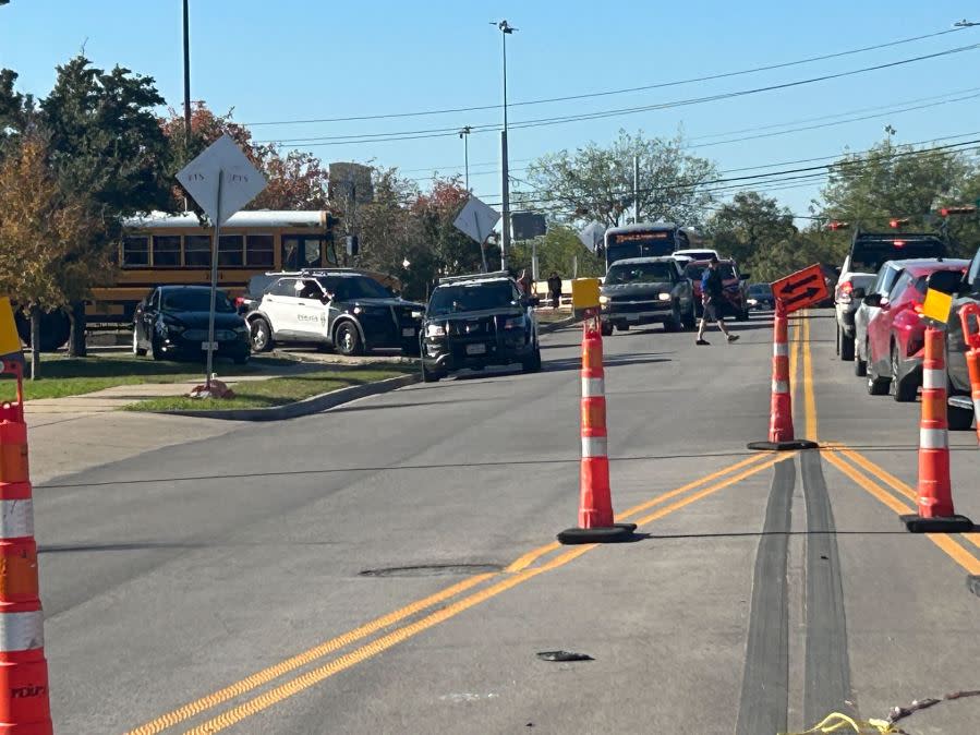 Northeast Early College High School students being picked up by their families at Delco Activity Center after an Austin ISD officer was shot and injured on campus on Dec. 5, 2023. (KXAN Photo/Frank Martinez)