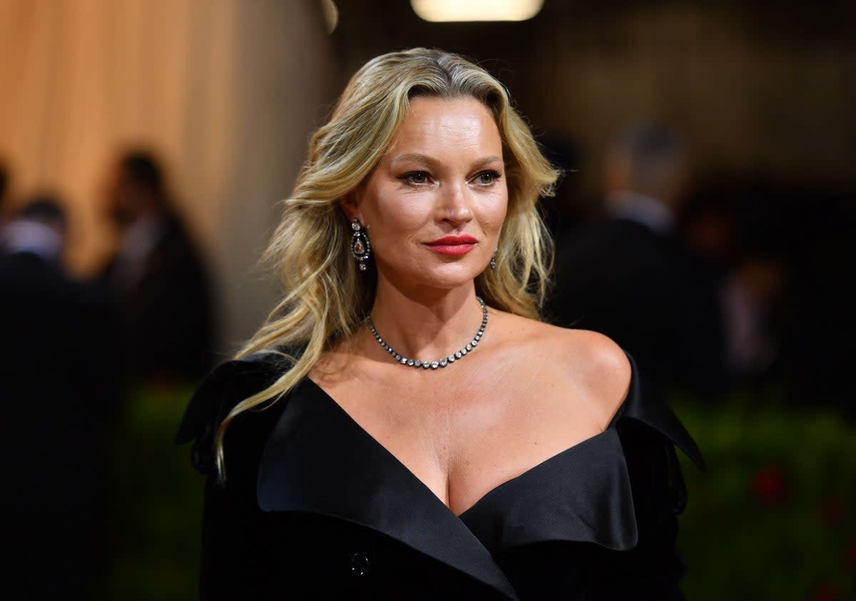 Kate Moss, after years of partying hard, has rebranded herself as a wellness guru   (AFP via Getty Images)