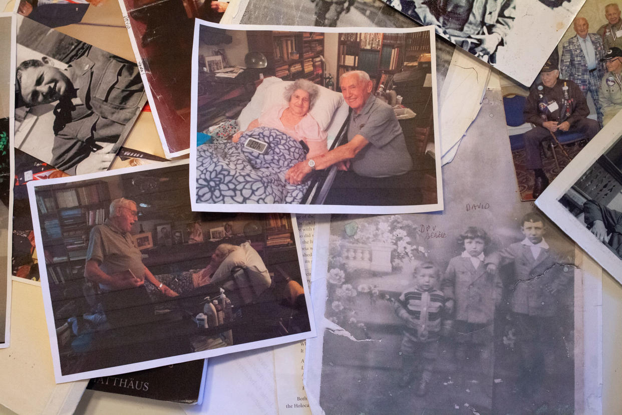 Various photographs of David Wisnia, an Auschwitz survivor, including some of his reunion with Helen Spitzer, a former lover, 72 years later, at his home in Levittown, Pa. on Nov. 2, 2019. <span class="copyright">Danna Singer—The New York Times/Redux</span>