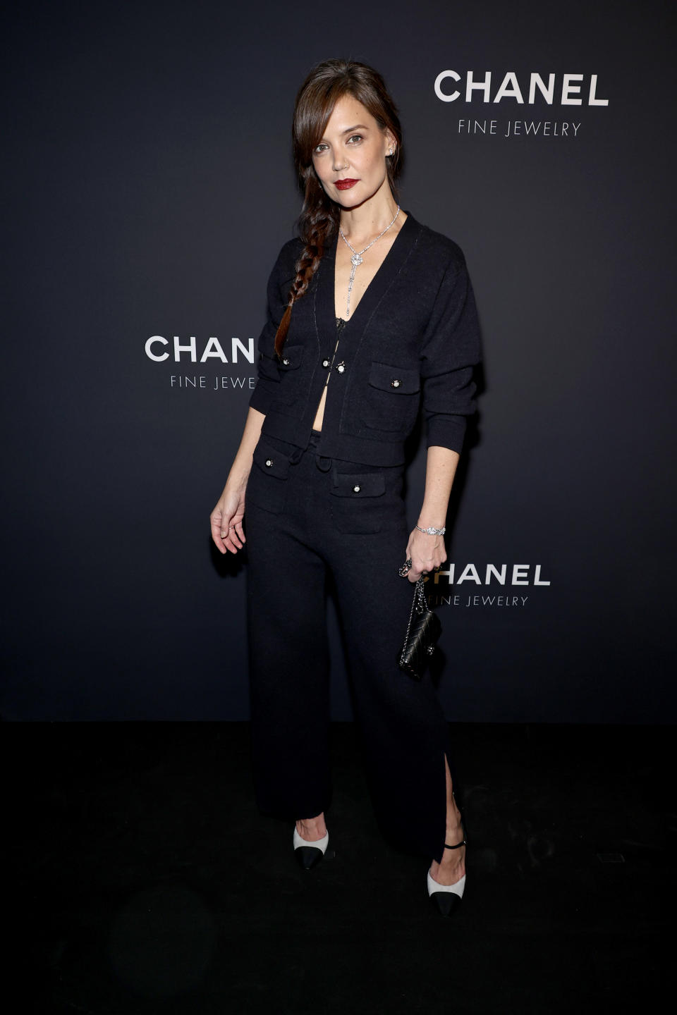 Katie Holmes at the Chanel Fine Jewelry dinner wearing a Chanel cardigan with a diamond necklace