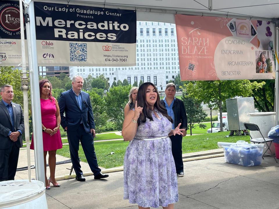 Columbus City Council Member Lourdes Barroso de Padilla gives her remarks at the ribbon cutting for the third annual Mercadito Raices, or 'Roots Market,' at Festival Latino.