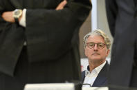 Rupert Stadler, the long-time head of Audi, who is accused of fraud, among other things, at the Munich Regional Court, Munich, Germany, Wednesday, Sept.30, 2020. Five years after the VW diesel scandal was uncovered, the first German criminal trial in this matter is now beginning. With the former Chairman of the Board of Management of Audi AG Stadler and the former member of the Board of Management of Porsche Hatz, two former leading Audi engineers are also accused. The trial is taking place under difficult conditions in a large hall at the Munich-Stadelheim prison on account of Corona. (Peter Kneffel/dpa via AP)