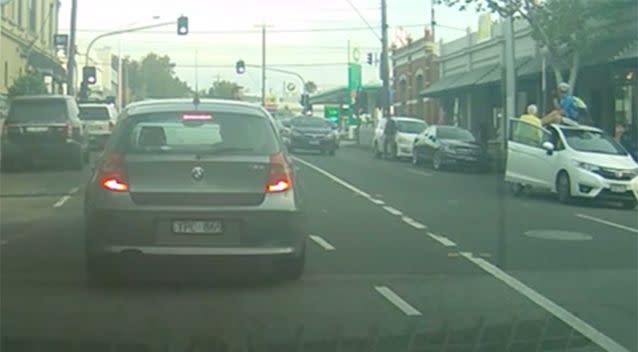 The cyclist waits for the vehicle to safely pull over. Photo: Newsflare/ Dracothian