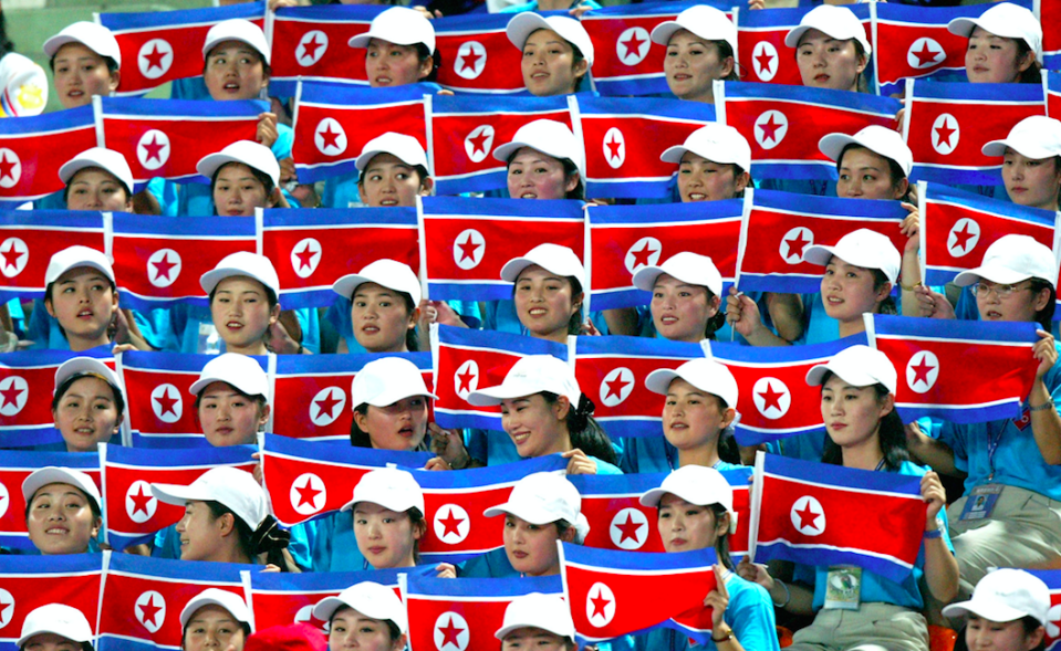 North Korea’s cheerleaders are going to the Winter Olympics (Picture: Rex)