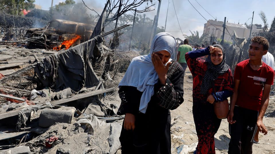 Palestinians after the attack in Khan Younis in the southern Gaza Strip. – Mohammed Salem/Reuters