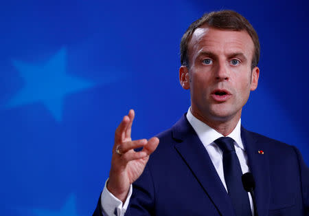 FILE PHOTO: French President Emmanuel Macron holds a news conference at the European Union leaders summit in Brussels, Belgium October 18, 2018. REUTERS/Francois Lenoir/File Photo