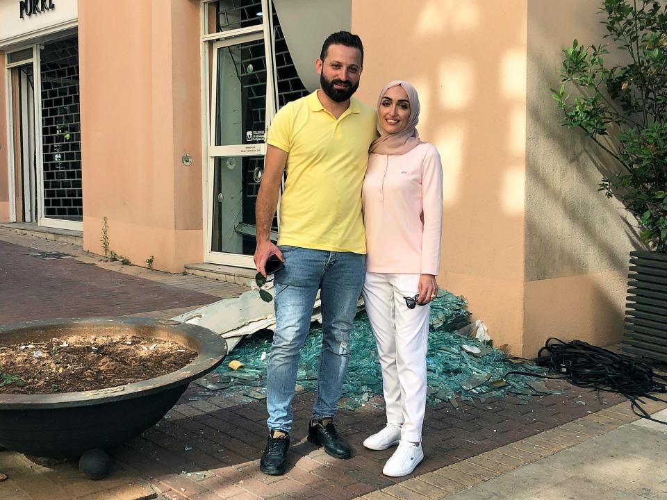 Bride Israa Seblani poses for a picture with her husband Ahmad Subeih in Beirut