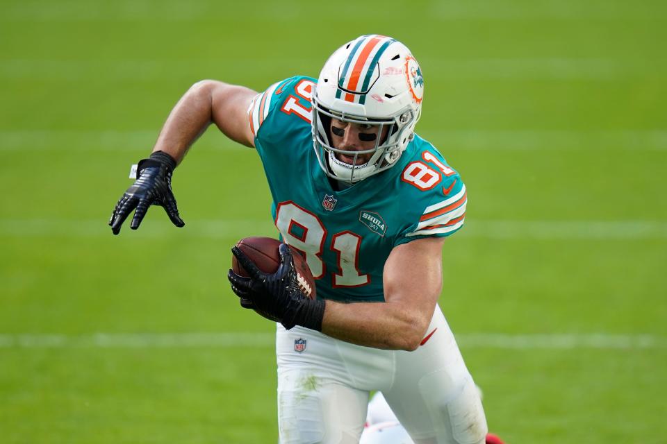Miami Dolphins tight end Durham Smythe (81) runs the football during the second half of an NFL football game against the New England Patriots, Sunday, Dec. 20, 2020, in Miami Gardens, Fla. (AP Photo/Chris O'Meara)